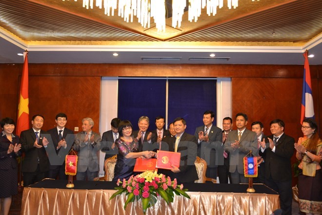 Лаосские руководители высоко оценили результаты сотрудничества между минюстами Вьетнама и Лаоса - ảnh 1